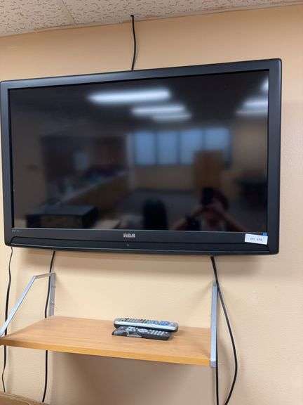 RCA TV  40”, remote, base & wall bracket (bring tools to remove) image
