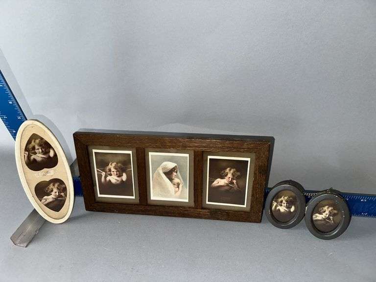 Three framed Cupid pictures image