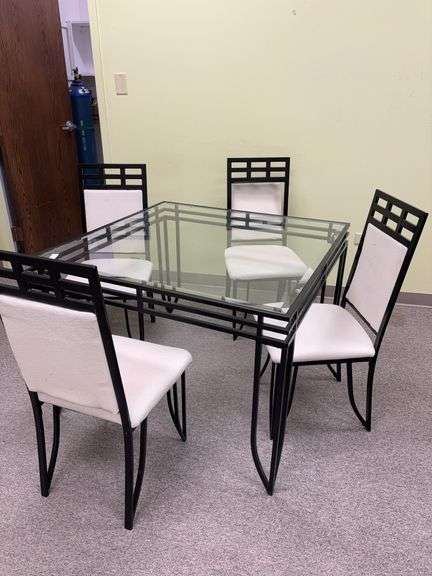 Glass top table 42” square and 4 chairs- broken glass, chairs have stains image