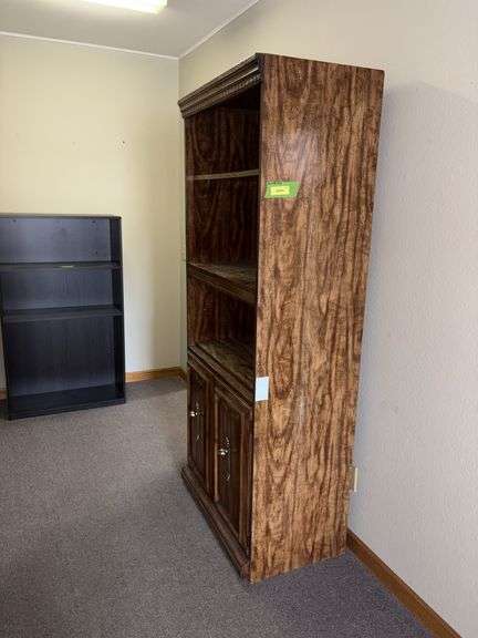18D x 31L x 75H bookcase with three shelves and double door lower storage
