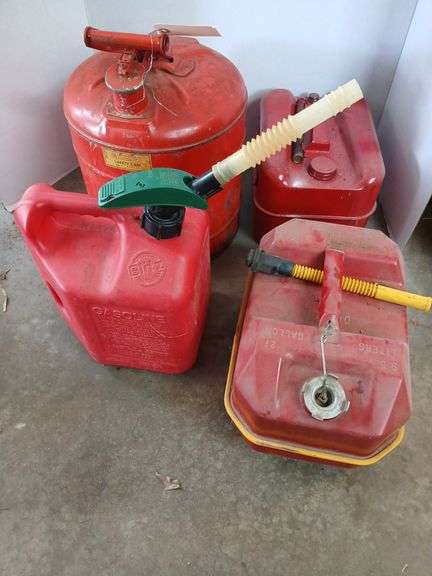 4 gas cans and 5 gallons of gas image