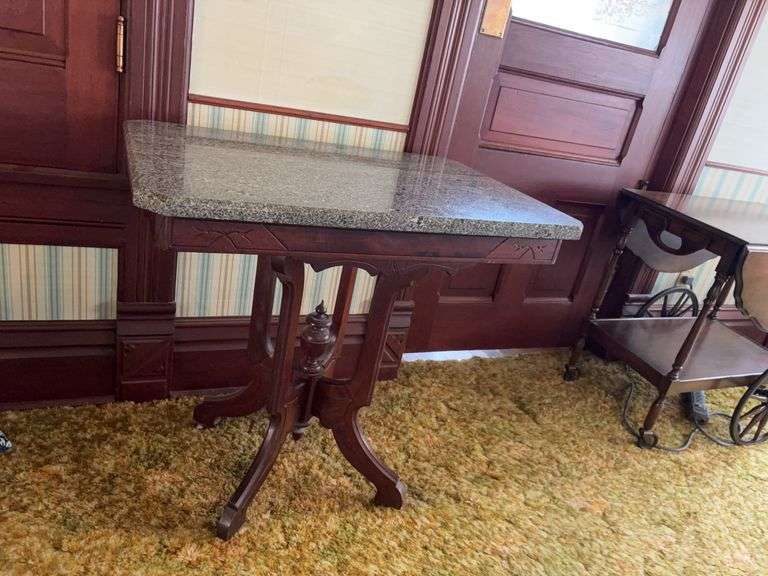 22x31x30H marble topped parlor table on porcelain wheels image