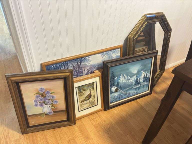 Assorted artwork and mirror image