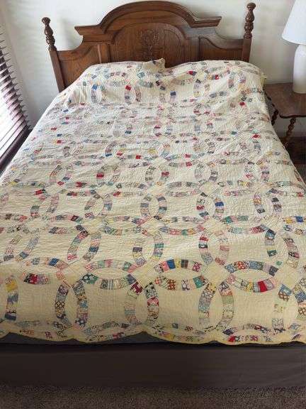 69 x 88 double wedding ring quilt, many worn spots image
