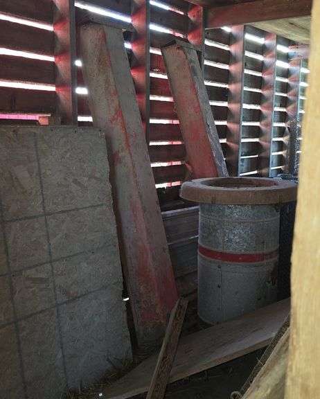 Cylinder hog feeder and 2 feed troughs image