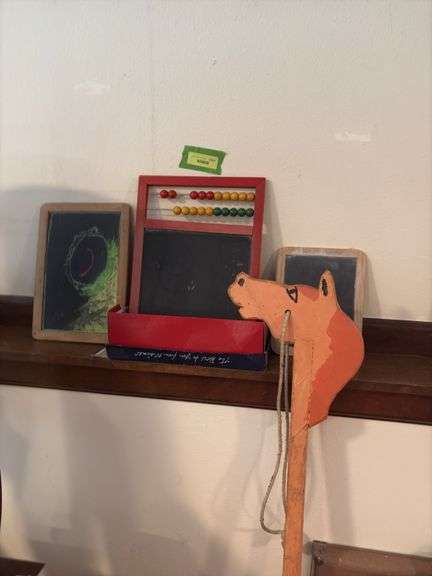 3 school slates and stick horse image