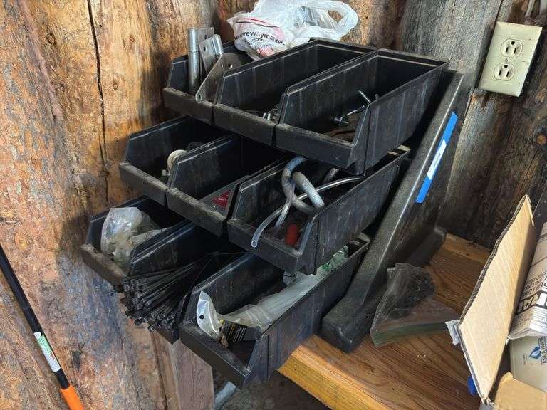 Black plastic assortment bin and contents includes zip ties, screws, and hardware large hinges image