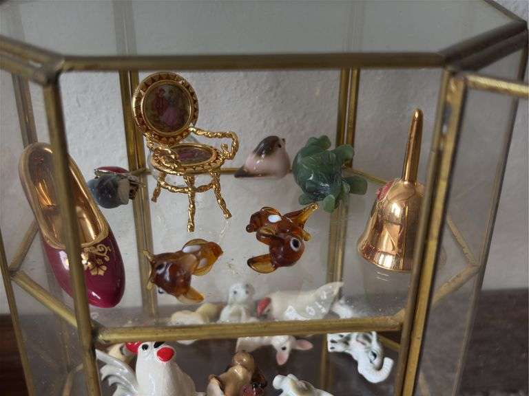 9” tall glass curio cabinet with miniatures
