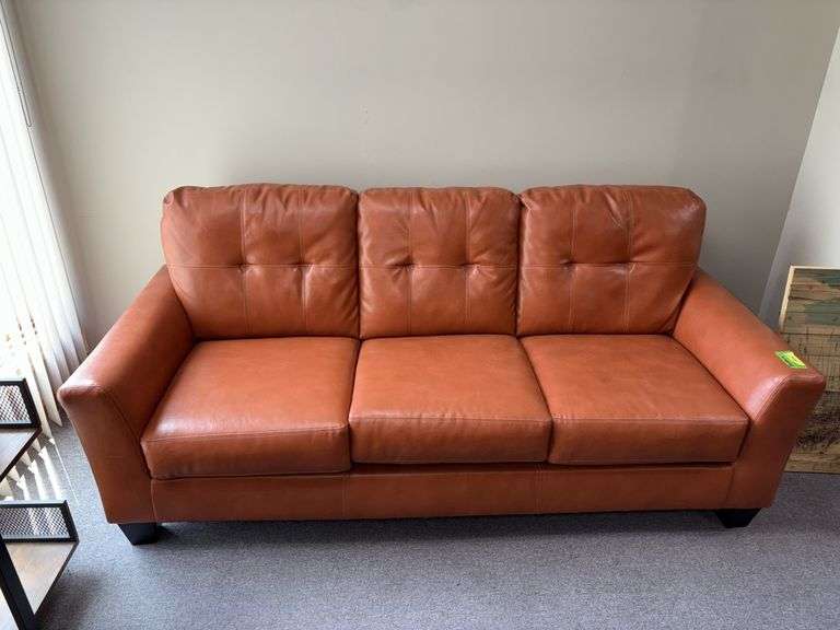 82” long Ashley three cushion sofa image
