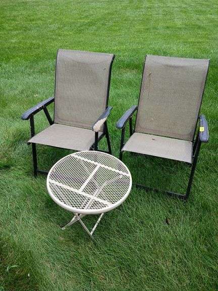 2 folding lawn chairs and folding table image