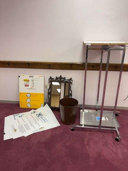 Roller rack, trash can, mirror, posters image