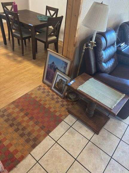 Solid wood end table, floor lamp, two art pieces, and small area rug image