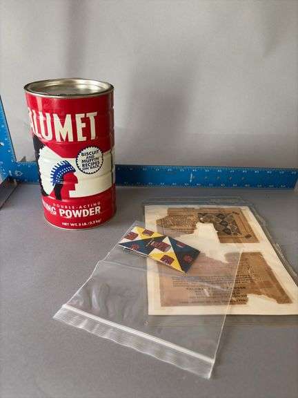 9” tall Calumet tin and puzzle image