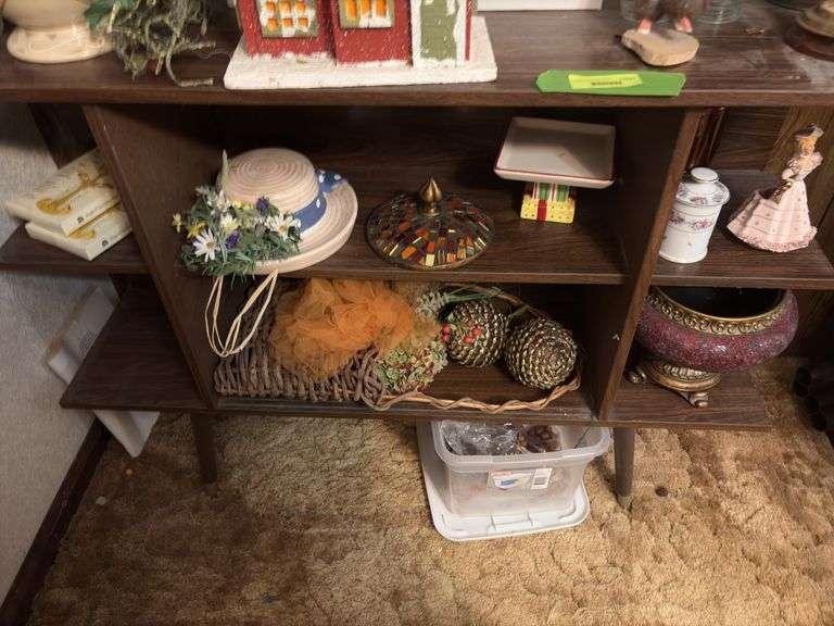 Shelf and contents includes decorative birdhouses, deco scale, bottles, trophies, etc