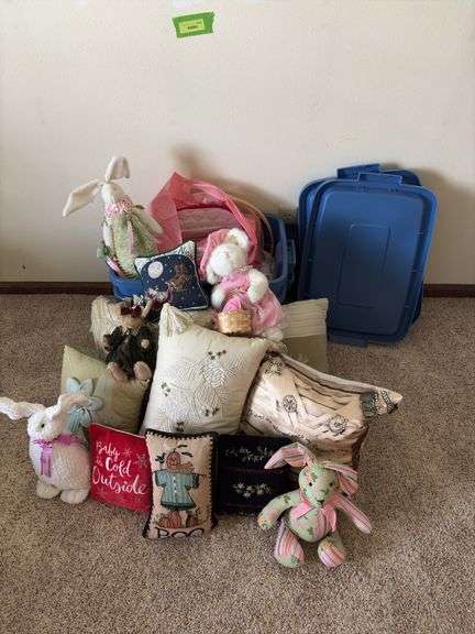 Pillows, stuffed rabbits and two totes to haul them home in image