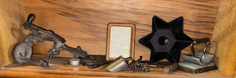 Reading hardware apple peeler, skeleton keys, tin scoop, fluting iron, star cake pan, old forceps. image