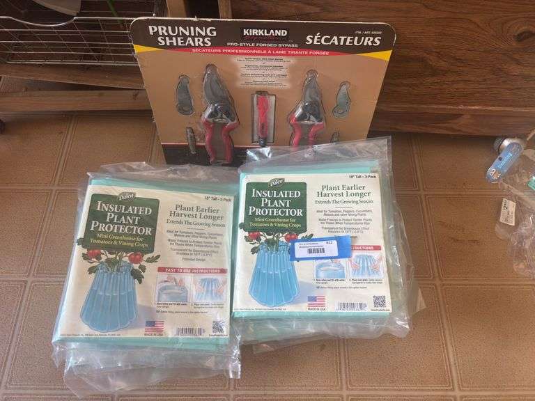 Large group of insulated plant protectors, and pruning shears new in package image