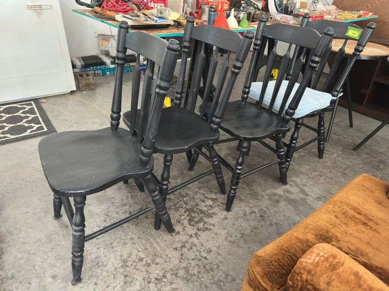 4 black painted chairs