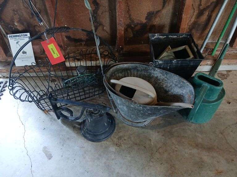 Coal scuttle, watering cans, bell and wire basket image