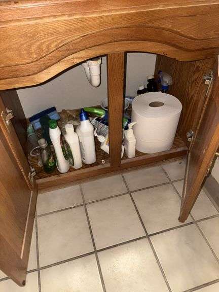 Contents of bathrooms includes (2) two  drawer cabinets, cleaning supplies, paper products, etc
