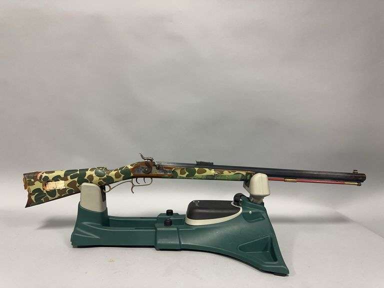 Connecticut Valley Arms Hawken model muzzleloader .54 ca wood stock w/camo tape applied 28" bbl, brass trigger guard image