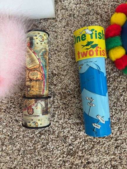 Two kaleidoscopes and BOY and GIRL birthday hats