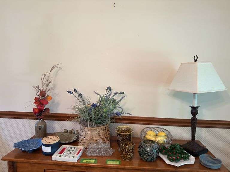 On top of table includes table lamp, three footed console bowl w lemons, candle holders, pottery, etc image