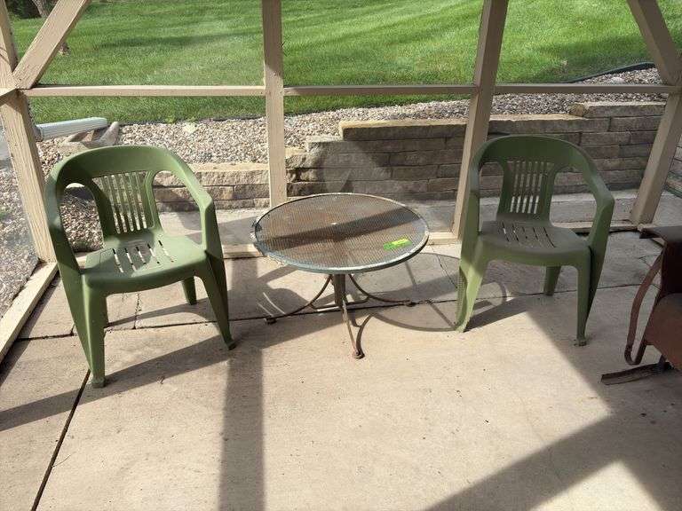 Metal patio table and 2 resin chairs image