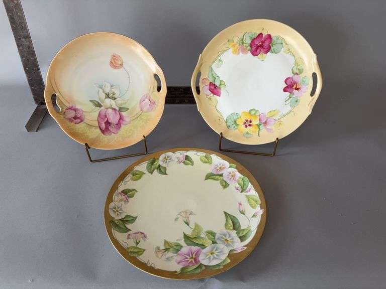 Three hand painted plates image