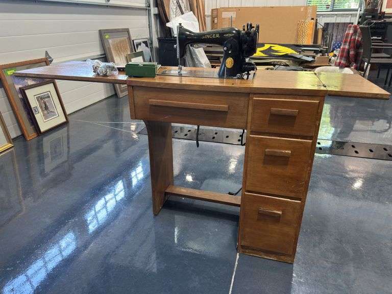 Singer 15-91 sewing machine in cabinet image