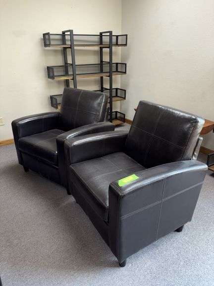 Two pleather arm chairs image