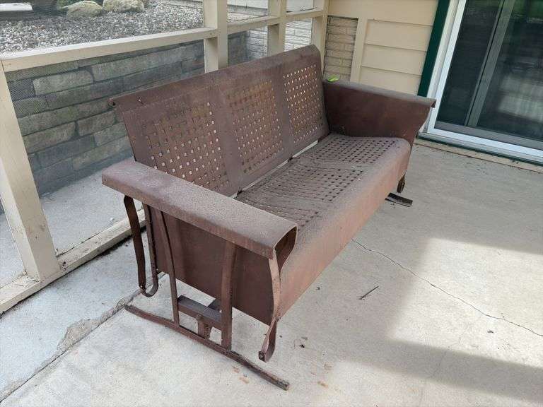 Vintage metal patio glider 56" wide. A classic!