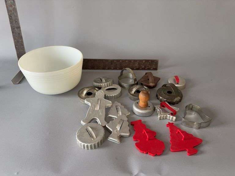 Milk glass mixing bowl with vintage cookie and biscuit cutters image