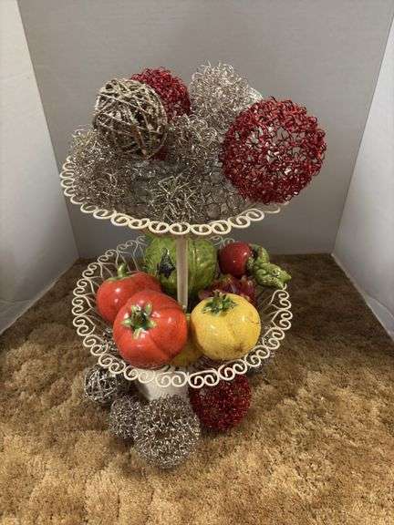 Decorative stand with wire balls and ceramic fruit image