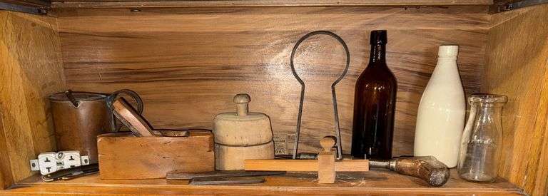 Wooden butter mold, stoneware and glass bottles, wood boat plane, hand drill, small "oil" can image