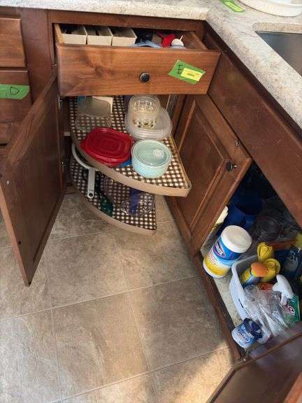 Kitchen utensils, plastic storage containers, cleaning supplies “E” cupboards image