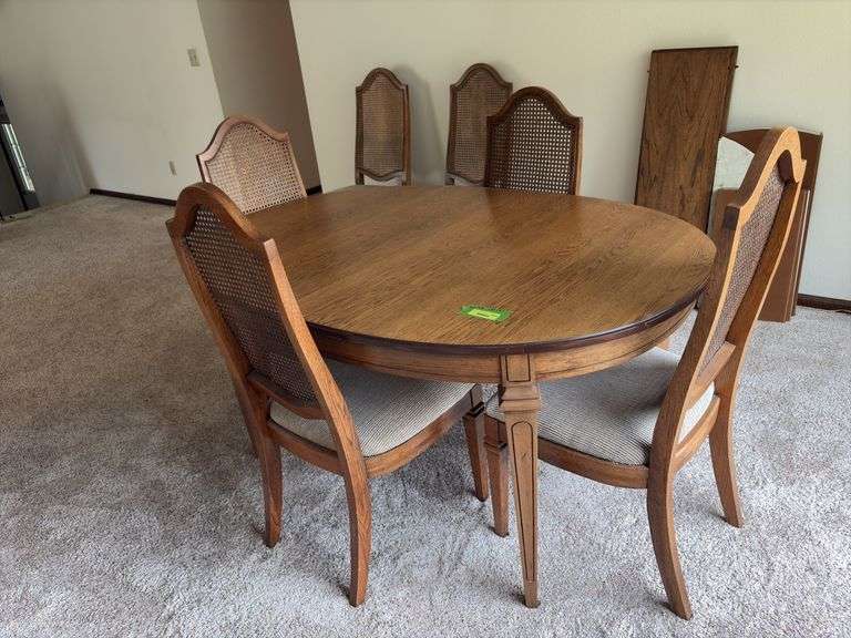 60x42 dining table with (3) 12” leaves, six chairs and table pads image
