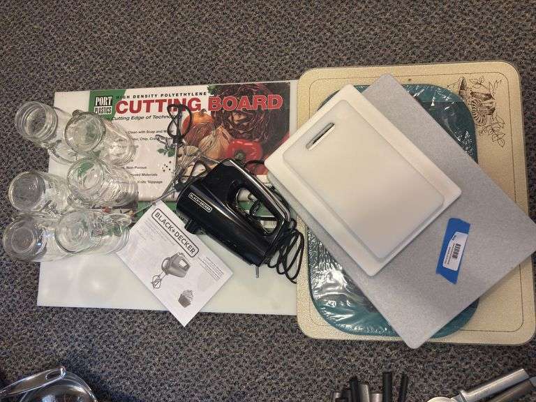 Black & Decker hand mixer, assortment of cutting boards and handled drinking glasses image