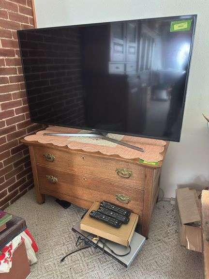 Samsung 55" flat screen tv, Philips DVD player and Emerson VHS player image