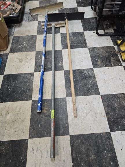 2 concrete rakes and scraper image