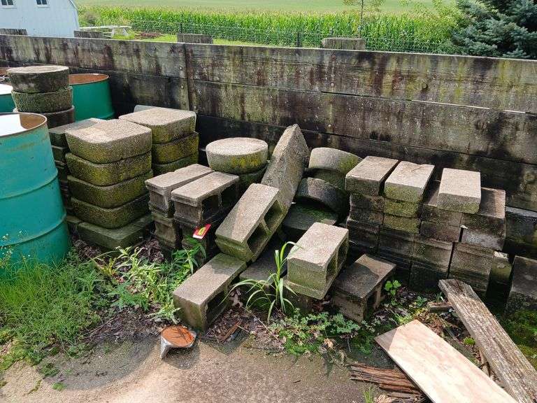 Qty of cement hog pans, cement blocks and cement flat pads image