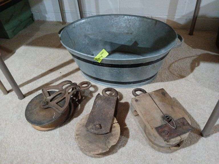 3 wooden pulleys and oval washtub