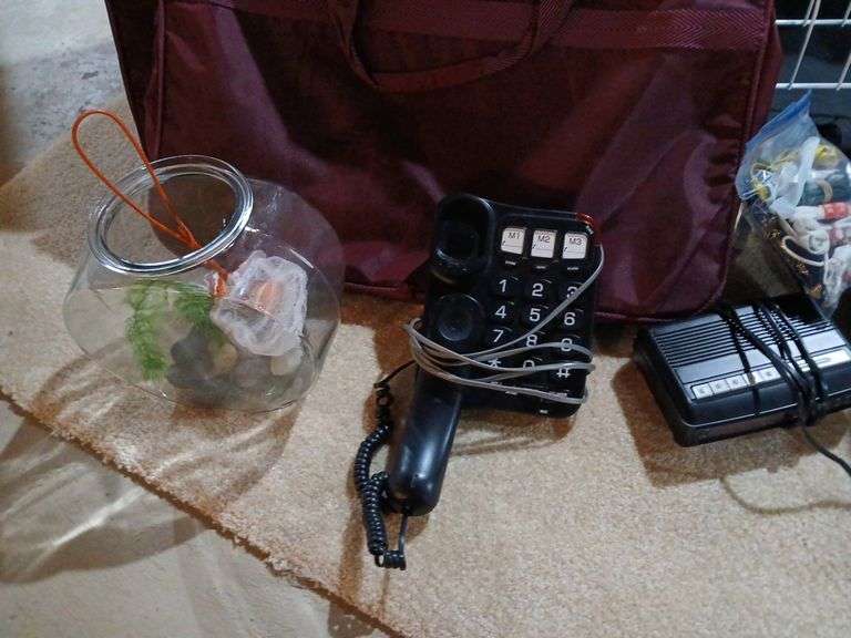 Luggage, retro hairdryer, landline phone, fish bowl, shoe rack, etc