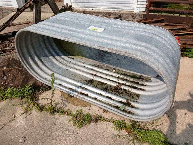 24 x 60 stock tank holding rain water image