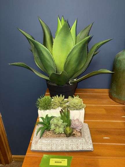 Artificial succulents in planters image