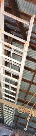 40' alum extension ladder w/ red barn paint on it! image