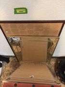 Wall mirror, cork boards, framed poster, etc