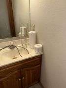 Contents of bathrooms includes (2) two  drawer cabinets, cleaning supplies, paper products, etc