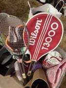 Tote with ball caps, single wine bottle carriers, water bottles, tennis rackets, LED shoe lights, etc