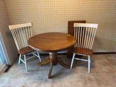 42” round dining table w 18” leaf and two chairs